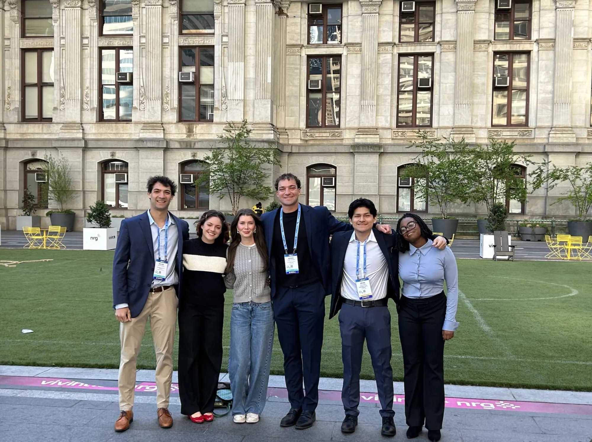 Student attendees with conference badges outside Philadelphia City Hall