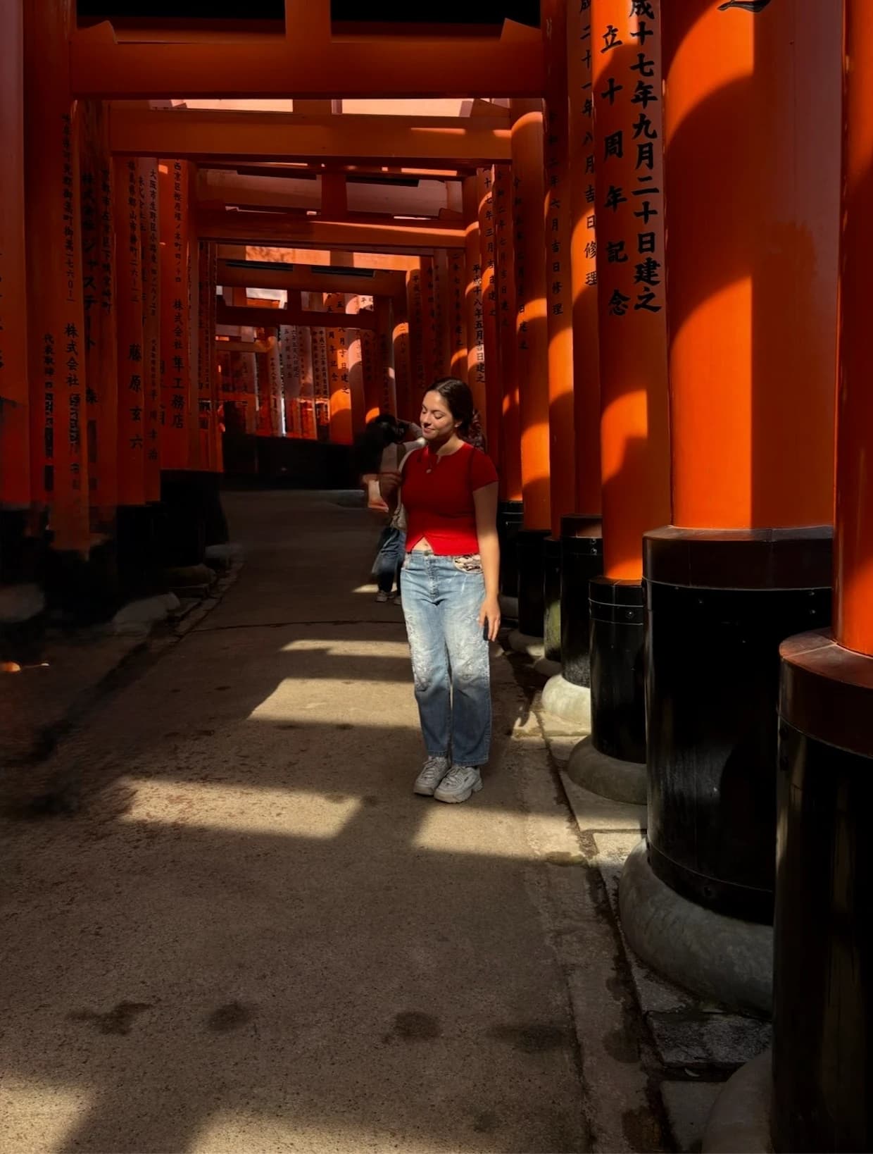 Walking through the torii gates at Fushimi Inari